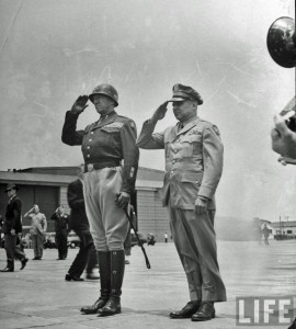 LtGenJamesHDoolittleRwithGenGeorgeSPattonsalutingastheyreviewtroopsafterlandingatairfieldLosAngeles1945_zpse8564cb8