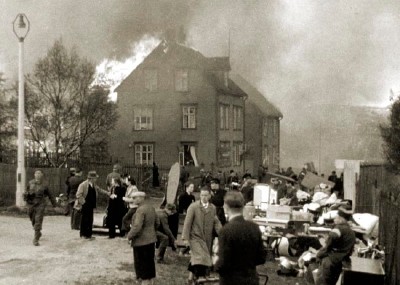 4th July 1940: Houses are burnt to the ground in the Norwegian city of Narvik during the German invasion. (Photo by Fox Photos/Getty Images)